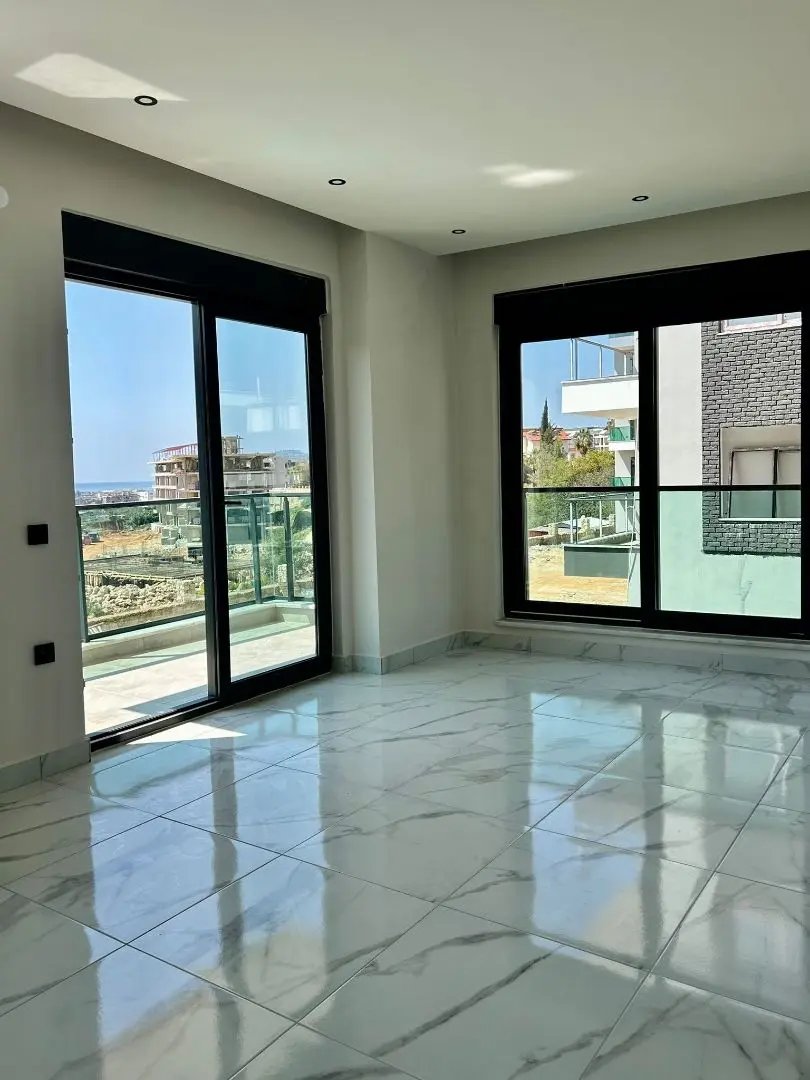 EMPTY 1+1 APARTMENT IN A FULL FACILITY BUILDING IN OBA-ALANYA