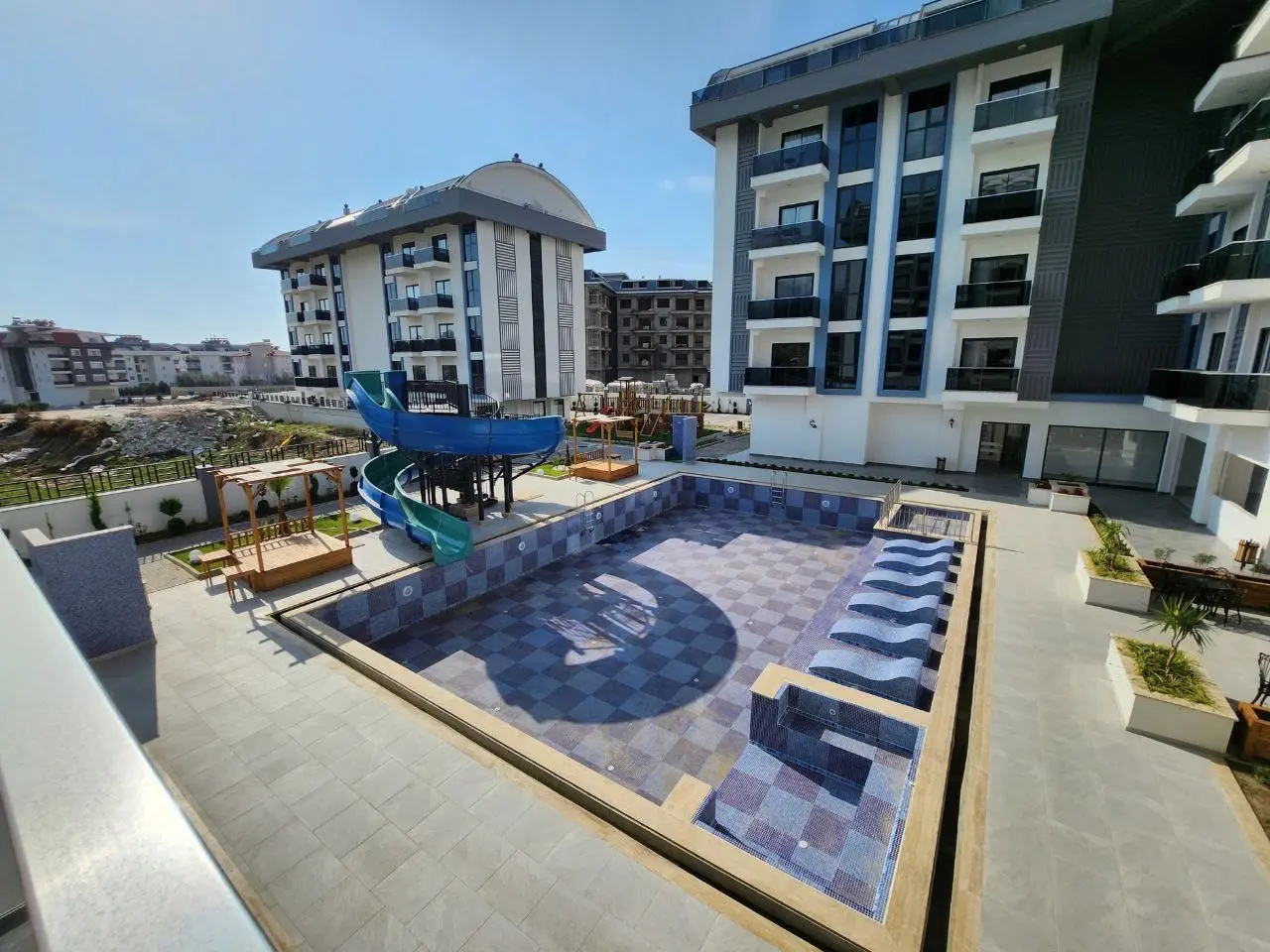 1+1 FLAT IN A SITE WITH FULL ACTIVITIES FOR SALE IN OBA, ALANYA