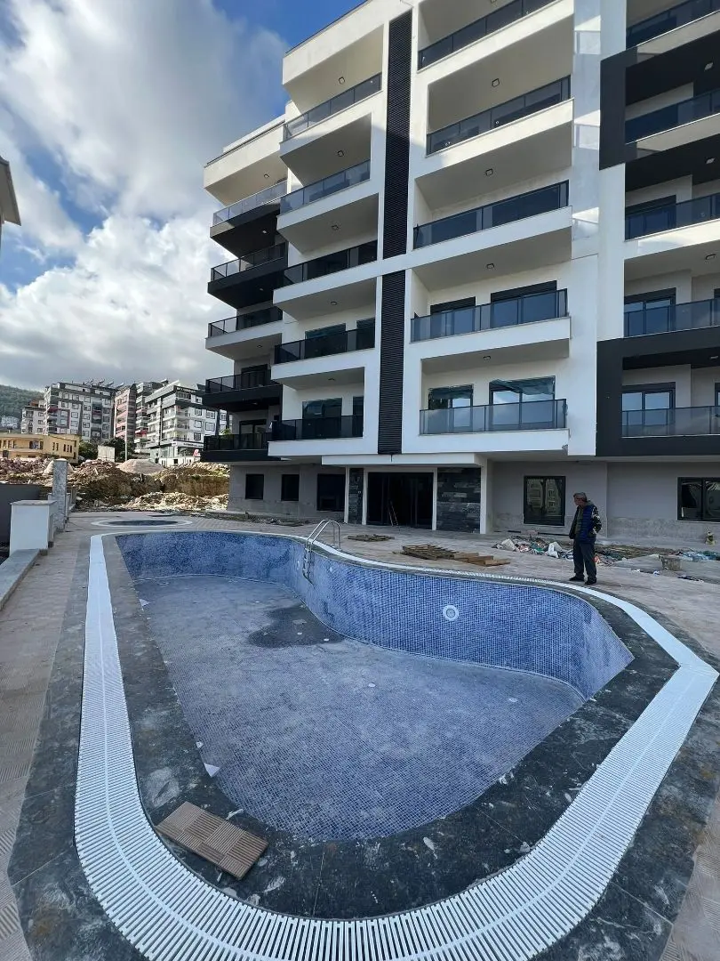 UNFURNISHED 1+1  FLAT IN A NEWLY BUILT COMPLEX IN ALANYA